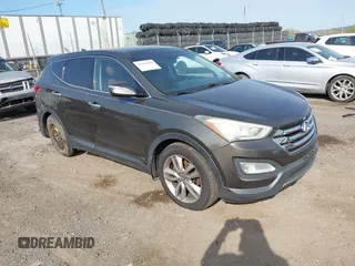 2013 Hyundai Santa Fe Sport z VIN 5XYZW3LA3DG068434, wystawiony jako IAAI lot #42167040 z przebiegiem 140 928 mil mil oraz . Historia ofert i sprzedaży dostępna na DreamBid. Obrazek 1.
