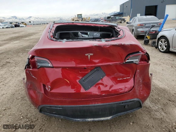2025 Tesla Model Y Long Range with VIN 7SAYGAEE4SF298925, listed as a Copart auction lot 49816045 with 0 mi miles and Clean Title. Bid and sale history available at carsss.com. Image 6.