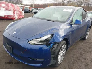 2023 Tesla Model Y Long Range z VIN 7SAYGDEE2PF694974, wystawiony jako IAAI lot #41814582 z przebiegiem 31 726 mil mil oraz . Historia ofert i sprzedaży dostępna na DreamBid. Obrazek 6.