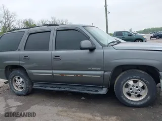 2002 Chevrolet Tahoe LT with VIN 1GNEC13Z02R243052, listed as a IAAI auction lot 41909540 with 360,010 mi miles. Bid and sale history available at carsss.com. Image 13.