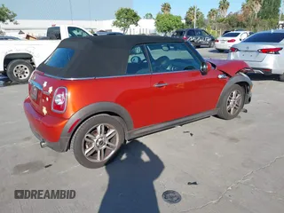 2012 MINI Convertible with VIN WMWZN3C54CT134124, listed as a IAAI auction lot 42313148 with 119,963 mi miles and . Bid and sale history available at DreamBid. Image 4.