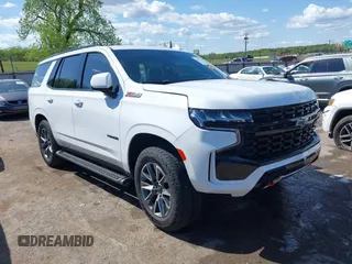 2023 Chevrolet Tahoe Z71 with VIN 1GNSKPKD0PR411701, listed as a IAAI auction lot 42065739 with 21,659 mi miles and . Bid and sale history available at DreamBid. Image 1.