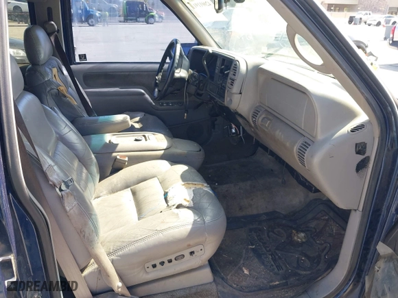 1999 Chevrolet Tahoe with VIN 1GNEC13R7XJ573387, listed as a IAAI auction lot 42001191 with 241,007 mi miles. Bid and sale history available at carsss.com. Image 5.