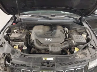 2014 Jeep Grand Cherokee Overland with VIN 1C4RJFCG8EC177899, listed as a IAAI auction lot 41695290 with 200,867 mi miles and . Bid and sale history available at DreamBid. Image 10.