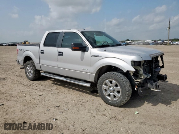 2014 Ford F-150 XL with VIN 1FTFW1ET0EKG04449, listed as a Copart auction lot 62642725 with 223,472 mi miles and Salvage title. Bid and sale history available at DreamBid. Image 4.