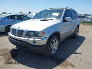 2001 BMW X5 4.4i with VIN WBAFB33511LH18797, listed as a IAAI auction lot 42075328 with 169,396 mi miles. Bid and sale history available at carsss.com. Image 2.