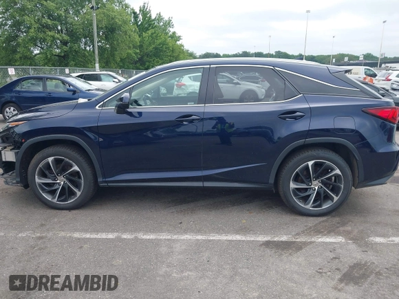 2016 Lexus RX 350 with VIN 2T2BZMCA0GC001767, listed as a IAAI auction lot 42571629 with 84,041 mi miles and . Bid and sale history available at DreamBid. Image 14.