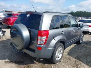 2006 Suzuki Grand Vitara Luxury z VIN JS3TE947864103082, wystawiony jako IAAI lot #42470917 z przebiegiem 155 702 mil mil oraz . Historia ofert i sprzedaży dostępna na DreamBid. Obrazek 4.