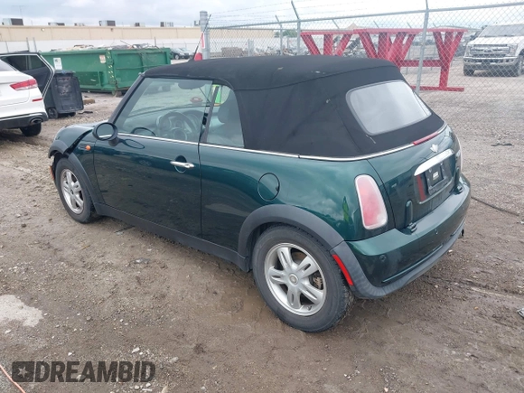 2005 MINI Convertible with VIN WMWRF33495TG11818, listed as a IAAI auction lot 42351446 with 100,033 mi miles and . Bid and sale history available at DreamBid. Image 3.