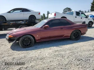 1990 Nissan Skyline z VIN BNR32011442, wystawiony jako Copart lot #64651064 z przebiegiem 118 579 mil mil oraz Czysty tytuł • Clean title. Historia ofert i sprzedaży dostępna na DreamBid. Obrazek 1.