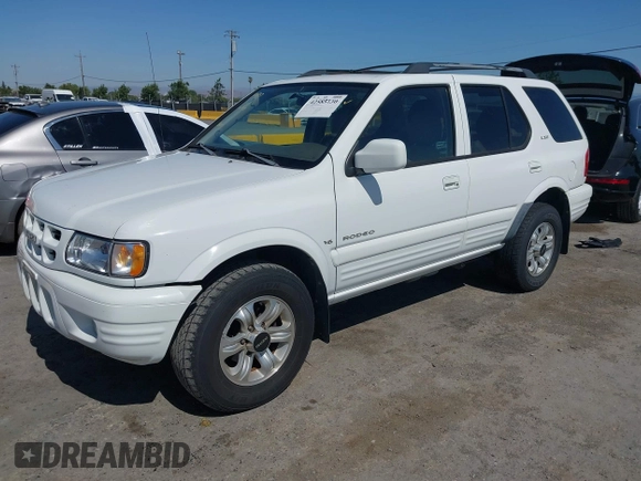 2001 Isuzu Rodeo S with VIN 4S2CK58W614332181, listed as a IAAI auction lot 42585130 with 196,497 mi miles and . Bid and sale history available at DreamBid. Image 17.