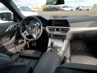 2023 BMW 4 Series 430i xDrive z VIN WBA73AP01PCL59557, wystawiony jako Copart lot #76059444 z przebiegiem 16 782 mil mil oraz Szkoda całkowita • Salvage title. Historia ofert i sprzedaży dostępna na DreamBid. Obrazek 8.