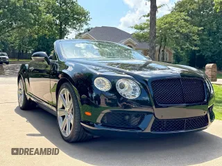 2014 Bentley Continental GT V8 z VIN SCBGT3ZAXEC091743, wystawiony jako Copart lot #62013135 z przebiegiem 31 671 mil mil oraz Czysty tytuł • Clean title. Historia ofert i sprzedaży dostępna na DreamBid. Obrazek 1.