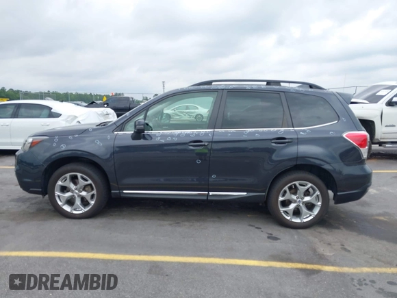 2018 Subaru Forester Touring with VIN JF2SJAWC2JH492788, listed as a IAAI auction lot 42358591 with 83,354 mi miles and . Bid and sale history available at DreamBid. Image 14.