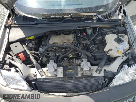 2001 Pontiac Montana with VIN 1GMDX03E61D318330, listed as a Copart auction lot 52063885 with 98,926 mi miles and Salvage Title. Bid and sale history available at DreamBid. Image 12.