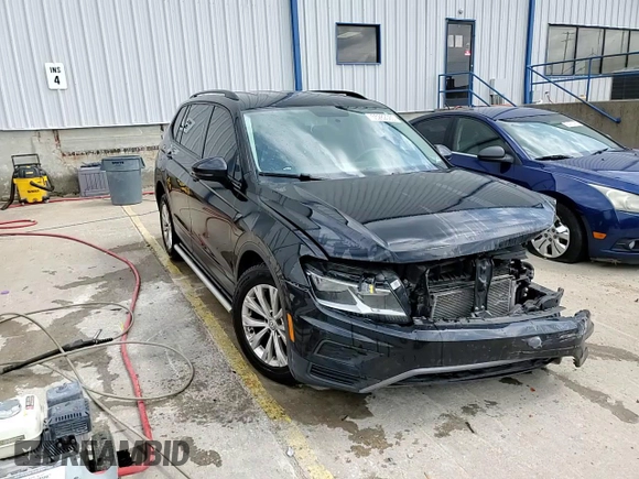2018 Volkswagen Tiguan S с VIN 3VV0B7AX2JM105105, выставлен на аукционе Copart как лот 55282085 с пробегом 153 133 миль миль и На запчасти • Non repairable. История ставок и продаж доступна на DreamBid. Изображение 15.
