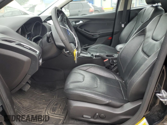 2017 Ford Focus Titanium with VIN 1FADP3J23HL218867, listed as a Copart auction lot 55417305 with 98,710 mi miles and Salvage title. Bid and sale history available at DreamBid. Image 7.