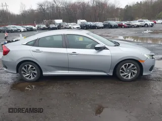 2016 Honda Civic EX with VIN 19XFC2F75GE217935, listed as a IAAI auction lot 41963307 with 87,477 mi miles and . Bid and sale history available at DreamBid. Image 13.