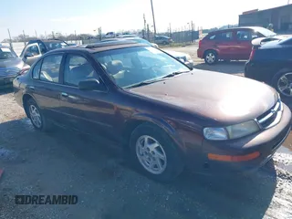 1998 Nissan Maxima GXE z VIN JN1CA21DXWT605810, wystawiony jako IAAI lot #41610501 z przebiegiem Nie podano mil oraz . Historia ofert i sprzedaży dostępna na DreamBid. Obrazek 1.