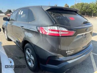 2020 Ford Edge SE z VIN 2FMPK3G93LBB47281, wystawiony jako Copart lot #77013224 z przebiegiem 73 460 mil mil oraz Nie do naprawy • Non repairable. Historia ofert i sprzedaży dostępna na DreamBid. Obrazek 3.
