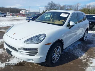 2014 Porsche Cayenne with VIN WP1AA2A2XELA95734, listed as a IAAI auction lot 41583908 with 95,751 mi miles and . Bid and sale history available at DreamBid. Image 6.