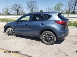 2016 Mazda CX-5 Grand Touring with VIN JM3KE2DY9G0724096, listed as a Copart auction lot 52249675 with 47,860 mi miles and Salvage Title. Bid and sale history available at carsss.com. Image 2.