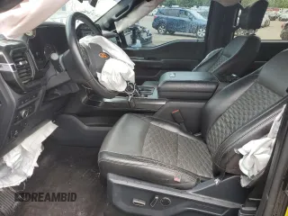 2021 Ford F-150 XL with VIN 1FTFW1E52MFB31825, listed as a Copart auction lot 61462735 with 76,653 mi miles and Salvage title. Bid and sale history available at DreamBid. Image 7.