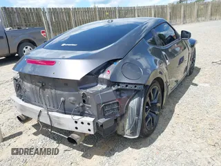 2010 Nissan 370Z Touring z VIN JN1AZ4EH1AM502464, wystawiony jako IAAI lot #42180616 z przebiegiem 145 598 mil mil oraz . Historia ofert i sprzedaży dostępna na DreamBid. Obrazek 4.