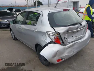 2012 Toyota Yaris L with VIN JTDKTUD30CD525956, listed as a IAAI auction lot 42057788 with 191,307 mi miles. Bid and sale history available at carsss.com. Image 3.