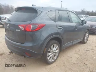 2013 Mazda CX-5 Grand Touring with VIN JM3KE4DE2D0164225, listed as a IAAI auction lot 41663412 with 162,738 mi miles. Bid and sale history available at carsss.com. Image 4.