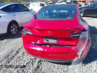 2020 Tesla Model 3 Standard Range Plus with VIN 5YJ3E1EA9LF708808, listed as a IAAI auction lot 40018323 with 32,069 mi miles. Bid and sale history available at carsss.com. Image 15.