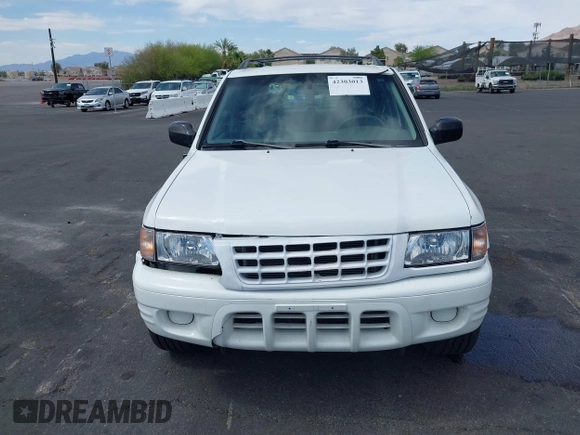 2001 Isuzu Rodeo S with VIN 4S2CK58W614329085, listed as a IAAI auction lot 42303013 with 171,933 mi miles and . Bid and sale history available at DreamBid. Image 12.