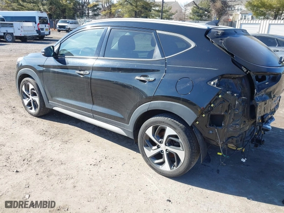 2018 Hyundai Tucson Value with VIN KM8J3CA26JU700642, listed as a IAAI auction lot 41655085 with 80,903 mi miles. Bid and sale history available at carsss.com. Image 3.