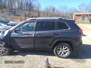 2015 Jeep Cherokee Latitude with VIN 1C4PJMCB5FW784536, listed as a IAAI auction lot 41667686 with 194,422 mi miles and . Bid and sale history available at carsss.com. Image 14.