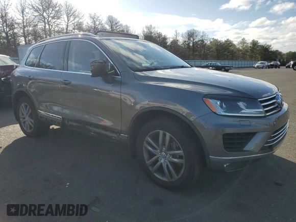 2015 Volkswagen Touareg Sport with VIN WVGEF9BP9FD007657, listed as a Copart auction lot 49432045 with 61,668 mi miles and Salvage title. Bid and sale history available at DreamBid. Image 4.
