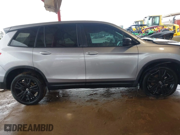 2021 Honda Passport Sport with VIN 5FNYF7H26MB014556, listed as a IAAI auction lot 41683680 with 97,829 mi miles and . Bid and sale history available at DreamBid. Image 13.