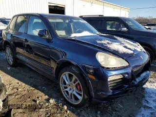 2010 Porsche Cayenne with VIN WP1AD2AP6ALA62078, listed as a Copart auction lot 42240135 with 127,848 mi miles and Salvage title. Bid and sale history available at DreamBid. Image 4.