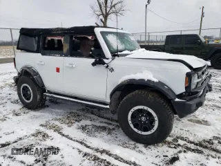 2024 Ford Bronco Outer Banks with VIN 1FMEE8BP1RLA50798, listed as a Copart auction lot 45704955 with 8,182 mi miles and Salvage title. Bid and sale history available at DreamBid. Image 4.