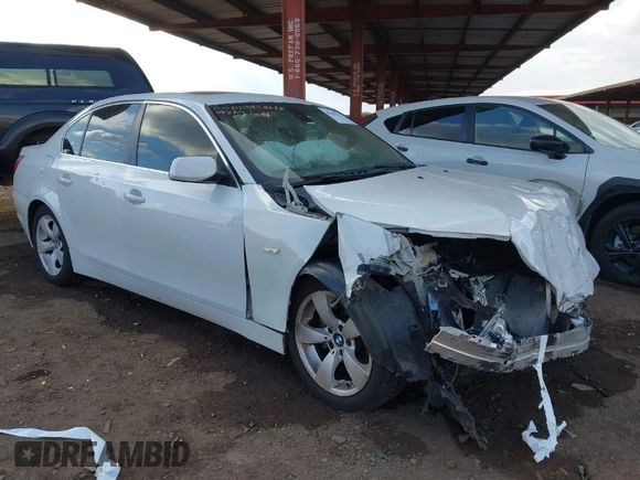 2007 BMW 5 Series 530i with VIN WBANE73537CM56751, listed as a IAAI auction lot 41461577 with 218,059 mi miles. Bid and sale history available at carsss.com. Image 1.