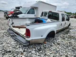 2001 Ford F-350 XL with VIN 1FTWW32F11EB16761, listed as a Copart auction lot 62511635 with 257,065 mi miles and Salvage title. Bid and sale history available at DreamBid. Image 3.