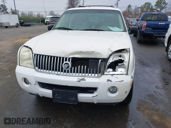 2002 Mercury Mountaineer Convenience z VIN 4M2ZU86W12ZJ35003, wystawiony jako IAAI lot #41193635 z przebiegiem 168 601 mil mil oraz . Historia ofert i sprzedaży dostępna na DreamBid. Obrazek 6.