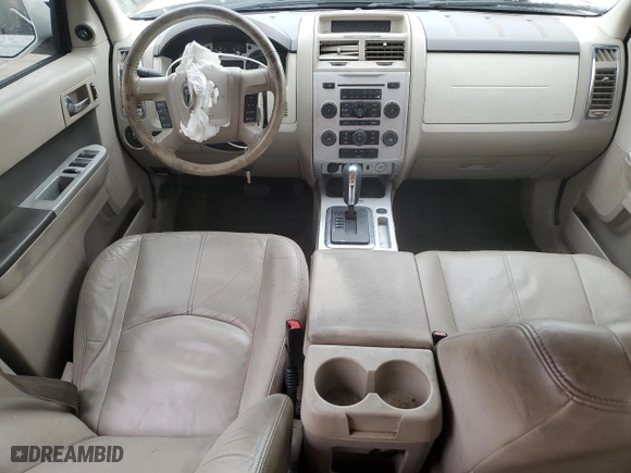 2009 Mercury Mariner Premier with VIN 4M2CU87G79KJ03236, listed as a Copart auction lot 84059324 with 130,335 mi miles and Salvage Title. Bid and sale history available at carsss.com. Image 8.