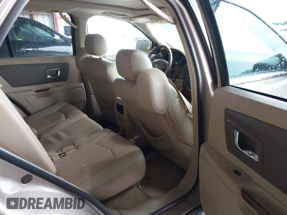 2006 Cadillac SRX z VIN 1GYEE637160193975, wystawiony jako IAAI lot #42187852 z przebiegiem 206 249 mil mil oraz . Historia ofert i sprzedaży dostępna na DreamBid. Obrazek 8.