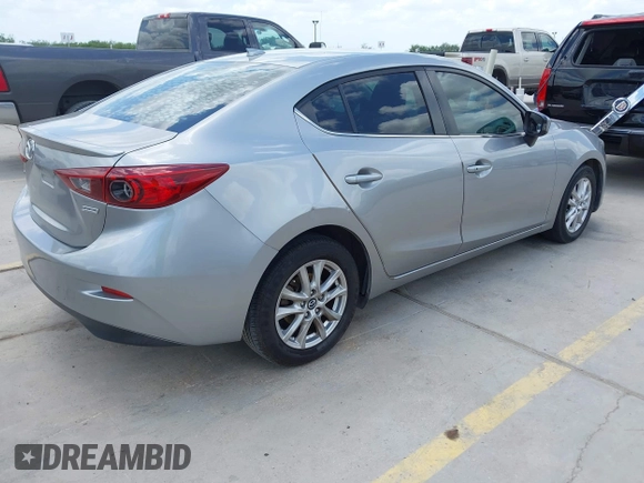 2015 Mazda 3 i Touring z VIN 3MZBM1V73FM144587, wystawiony jako IAAI lot #42422701 z przebiegiem 130 483 mil mil oraz . Historia ofert i sprzedaży dostępna na DreamBid. Obrazek 4.