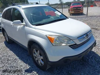 2007 Honda CR-V EX-L with VIN JHLRE387X7C053067, listed as a IAAI auction lot 41874349 with 316,774 mi miles. Bid and sale history available at carsss.com. Image 1.