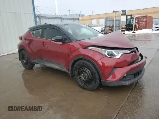 2019 Toyota C-HR XLE with VIN NMTKHMBX5KR067467, listed as a Copart auction lot 42779135 with 158,809 mi miles and Salvage Title. Bid and sale history available at DreamBid. Image 4.