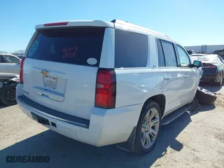 2016 Chevrolet Tahoe LTZ with VIN 1GNSKCKCXGR341155, listed as a IAAI auction lot 41244868 with 163,455 mi miles. Bid and sale history available at carsss.com. Image 4.