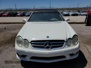 2007 Mercedes-Benz CLK 550 z VIN WDBTK72F97F222236, wystawiony jako Copart lot #60231835 z przebiegiem 123 549 mil mil oraz Czysty tytuł • Clean title. Historia ofert i sprzedaży dostępna na DreamBid. Obrazek 5.