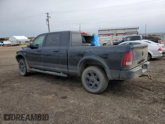 2015 Ram 3500 Laramie with VIN 3C63R3ML9FG590199, listed as a Copart auction lot 74700724 with 297,776 mi miles and Salvage Title. Bid and sale history available at carsss.com. Image 2.