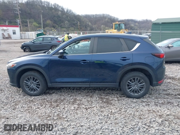 2019 Mazda CX-5 Touring with VIN JM3KFBCM5K0689948, listed as a IAAI auction lot 41976266 with 74,812 mi miles. Bid and sale history available at carsss.com. Image 14.